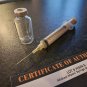 Michael Myers Halloween H20 Original Production Used Syringe and IV Bottle Prop