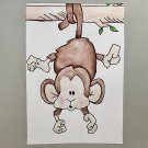 Monkey hanging from a tree Monkey hanging from a tree