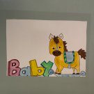 Baby with baby rocking horse