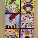 Six seasonal; celebration cats