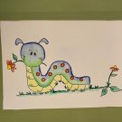 Caterpillar with orange flower