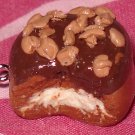 Chocolate frosted donut clay charm with yummy crumbles
