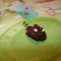 Chocolate cookie with white chocolate chunks charm