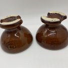 2 brown Pinco Insulators stamped 63 vintage collectible