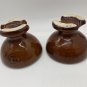 2 brown Pinco Insulators stamped 63 vintage collectible