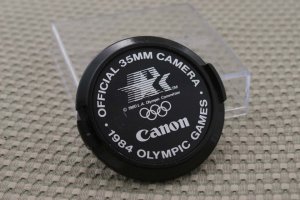 CANON AUTH 52mm 1984 OLYMPIC GAMES LENS CAP AE-1 H178