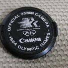 CANON AUTH 52mm 1984 OLYMPIC GAMES LENS CAP AE-1 H196