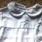 Flying Airplanes White Cotton Batiste Romper with Blue Trim and embroidered Airplanes and Clouds