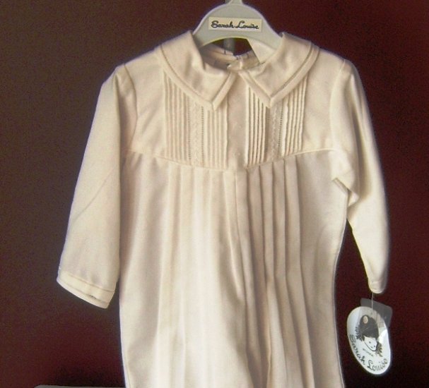 Sarah Louise Longall in Pale Ivory with pin tucking and delicate embroidery