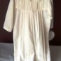Sarah Louise Longall in Pale Ivory with pin tucking and delicate embroidery