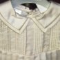 Sarah Louise Longall in Pale Ivory with pin tucking and delicate embroidery