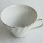 (1) Norleans Estate Fine China White Tea Cup Swirled Rim Platinum Trim