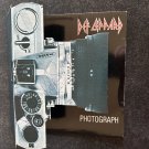 Def Leppard Autographed Photograph Vinyl 45 Pop Up Camera Sleeve Def Leppard Autographed Photograph Vinyl 45 Pop Up Camera Sleeve