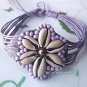 flower themed shell bead bracelet violet