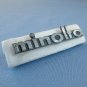 Vintage Minolta nameplate from srt models case