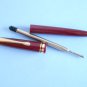 Vintage unbranded burgundy ballpoint pen empty refill