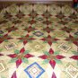King size Gold, Red, & Green Star Quilt - measures 100x100 inches