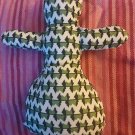 handsewn poppet doll in green and white