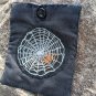 handmade spiderweb clutch square black