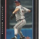 2002 Fleer Genuine - Greg Maddux #63 - Atlanta Braves