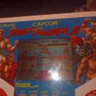 * Tiger electronics 1988 street fighter 2 tested works great