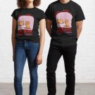a funny cat trying to murder a cute sleeping dog. humor , dark humor Classic T-Shirt