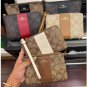 COACH Corner Zip Wristlet Canvas Signature Women's Wallet (Black)