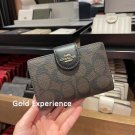 Coach Women's Wallet Signature Canvas Folded Wallet (Dark Brown With Logo)