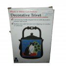 1994 Cast Iron Decorative Trivet Black and White Cat Pattern Kettle Shape Taiwan 1994 Cast Iron Decorative Trivet Black and White Cat Pattern Kettle Shape Taiwan