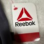 Reebok Men&acirc;��s Moisture Management 6-Pocket Pants 28x30 Stretch Ebony