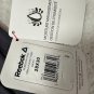 Reebok Men&acirc;��s Moisture Management 6-Pocket Pants 28x30 Stretch Ebony