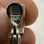Vintage NWH Silver Clip-On Earrings With Rhinestone Accents