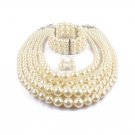 Classic Ivory Faux Pearl Multi-Strand Necklace Set with Bracelet and Earrings Classic Ivory Faux Pearl Multi-Strand Necklace Set with Bracelet and Earrings