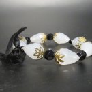 Vintage-Style Beaded Bracelet with Filigree Accents Vintage-Style Beaded Bracelet with Filigree Accents