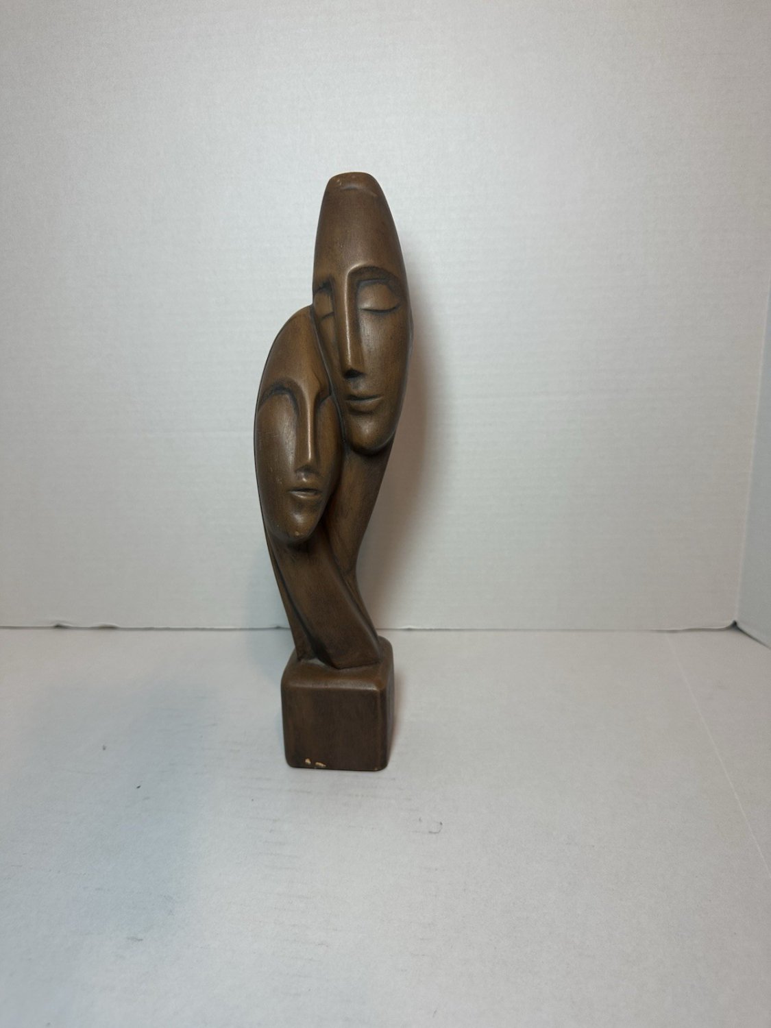 Vintage Mid-Century Modern "Lovers" sculpture, featuring two intertwined faces
