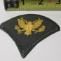 Authentic U.S. Army Specialist SPC Rank Patch - Gold Eagle on Green - E-4 Sew-On