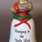 Vintage J.S.N.Y. Porcelain Christmas Bell - "Bringing in the Yule Log" - 4.5"