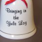Vintage J.S.N.Y. Porcelain Christmas Bell - "Bringing in the Yule Log" - 4.5"