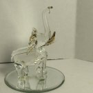 Blown Glass Elephant With Gold Tone Accents 3" Tall 2" Across Sits On Mirror Blown Glass Elephant With Gold Tone Accents 3" Tall 2" Across Sits On Mirror