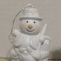Pale Blue Set Of Christmas Ornaments Snowman And Teddy Bear In Chimney