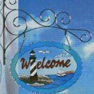 Glass Lighthouse Welcome Sign