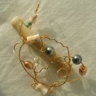 Wire Sculpted coral pendant with pearls