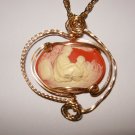 14 K rolled gold wire wrapped resin cameo w/24 inch gold chain