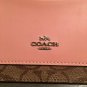 NWT $150 Coach Khaki & Petal Pink Coated Canvas & Leather Zip Top Wristlet 37565