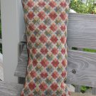 Multi coloured geometric pillow