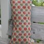 Multi coloured geometric pillow