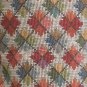 Multi coloured geometric pillow