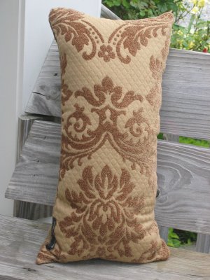 Green and gold pillow