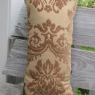 Green and gold pillow