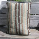 pale blue, beige and brown pillow